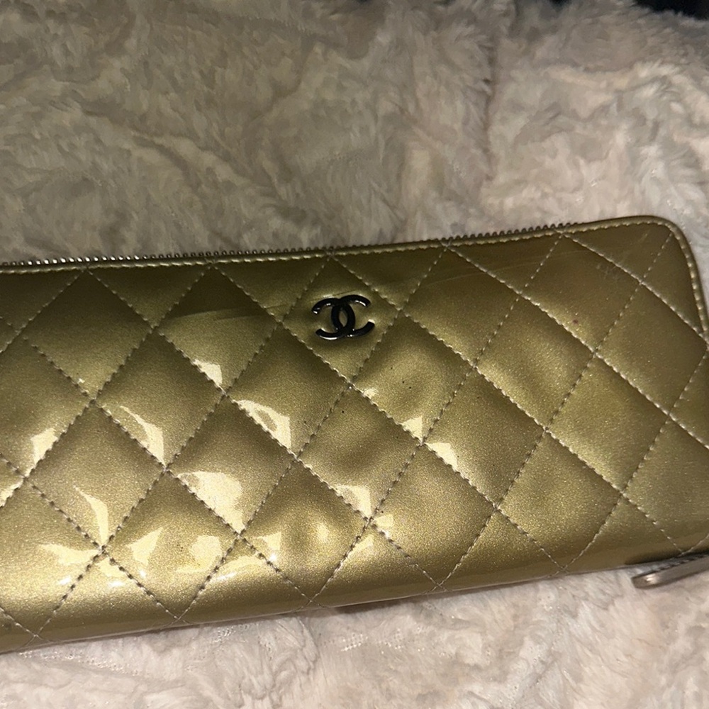 CHANEL Gold Quilted Wallet Luxurious Design